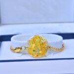 Resin Yellow Elegant Bracelet/ Rakhi With Gold Chain
