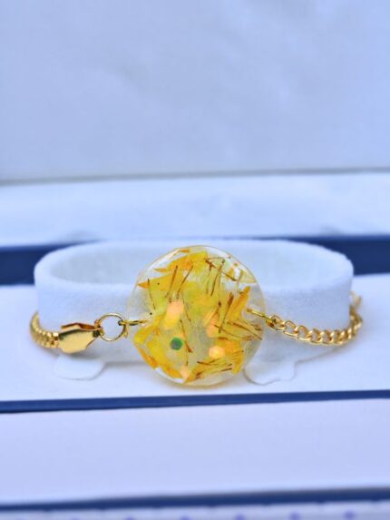 Resin Yellow Elegant Bracelet/ Rakhi With Gold Chain
