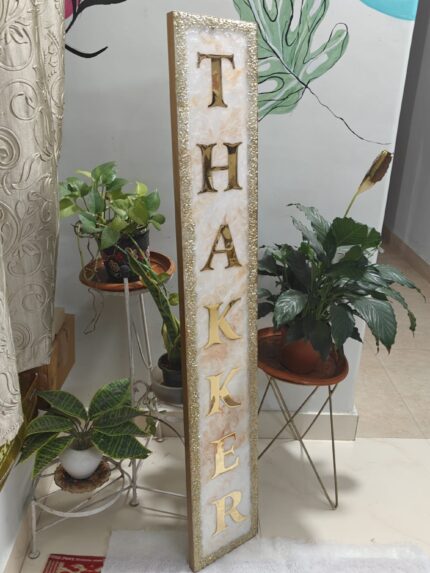 Handcrafted resin nameplate for home entrance – personalized with family name and floral design Custom epoxy resin nameplate with gold flakes and wooden base for house decor Elegant resin name board with marble texture and engraved couple names Personalized resin nameplate for main door with 3D flowers and metallic finish Unique handmade resin nameplate with modern calligraphy and glossy finish