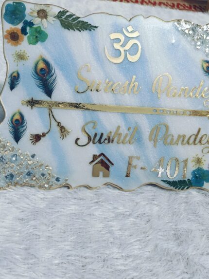 Handcrafted resin nameplate for home entrance – personalized with family name and floral design Custom epoxy resin nameplate with gold flakes and wooden base for house decor Elegant resin name board with marble texture and engraved couple names Personalized resin nameplate for main door with 3D flowers and metallic finish Unique handmade resin nameplate with modern calligraphy and glossy finish