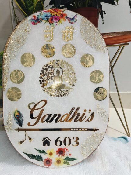 Handcrafted resin nameplate for home entrance – personalized with family name and floral design Custom epoxy resin nameplate with gold flakes and wooden base for house decor Elegant resin name board with marble texture and engraved couple names Personalized resin nameplate for main door with 3D flowers and metallic finish Unique handmade resin nameplate with modern calligraphy and glossy finish