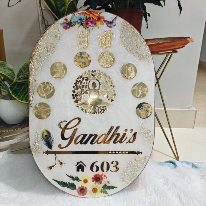 Handcrafted resin nameplate for home entrance – personalized with family name and floral design Custom epoxy resin nameplate with gold flakes and wooden base for house decor Elegant resin name board with marble texture and engraved couple names Personalized resin nameplate for main door with 3D flowers and metallic finish Unique handmade resin nameplate with modern calligraphy and glossy finish