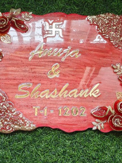 Handcrafted resin nameplate for home entrance – personalized with family name and floral design Custom epoxy resin nameplate with gold flakes and wooden base for house decor Elegant resin name board with marble texture and engraved couple names Personalized resin nameplate for main door with 3D flowers and metallic finish Unique handmade resin nameplate with modern calligraphy and glossy finish