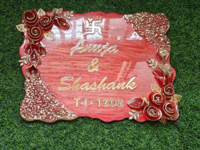 Handcrafted resin nameplate for home entrance – personalized with family name and floral design Custom epoxy resin nameplate with gold flakes and wooden base for house decor Elegant resin name board with marble texture and engraved couple names Personalized resin nameplate for main door with 3D flowers and metallic finish Unique handmade resin nameplate with modern calligraphy and glossy finish