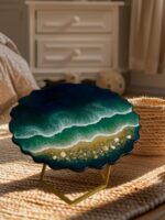 "Handcrafted ocean-inspired resin coffee table with natural wood grain and vivid blue resin waves, showcasing a unique and artistic design."