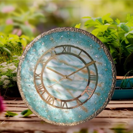 "Elegant marble-pattern geode wall clock with shimmering accents and gold-tone hands, blending artistic design with functionality."