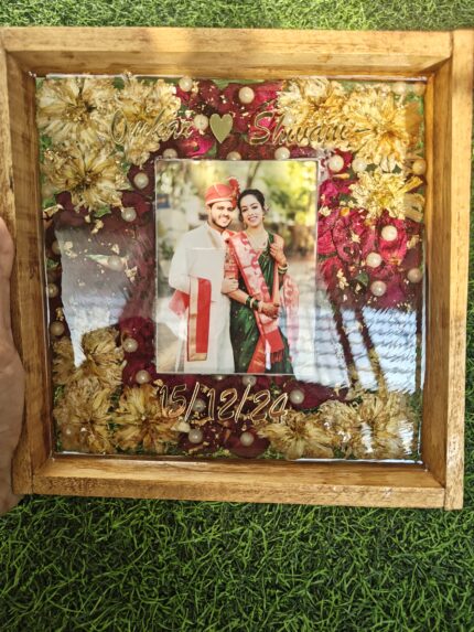 Handmade resin frame preserving wedding varmala flowers, symbolizing eternal love and cherished wedding memories.