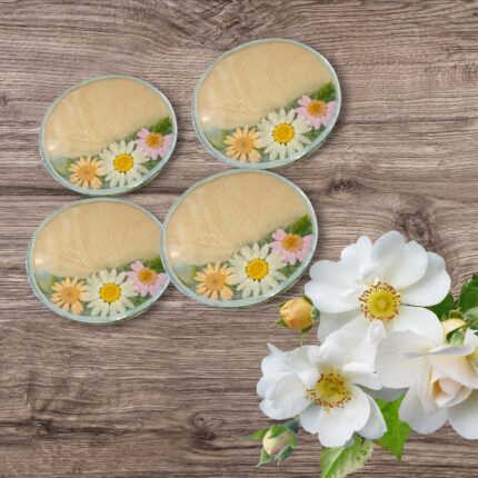 "Handcrafted resin coasters with real dried flowers, offering durable surface protection and elegant floral design for any table décor."