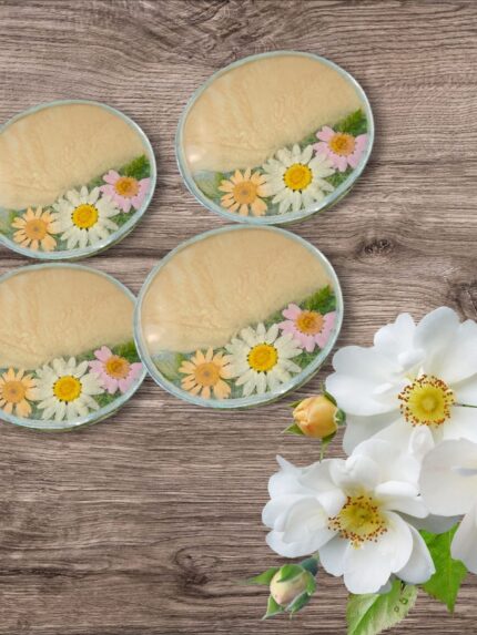 "Handcrafted resin coasters with real dried flowers, offering durable surface protection and elegant floral design for any table décor."