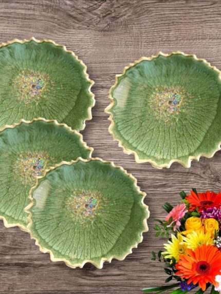 "Handcrafted green resin coasters with a sleek and vibrant design, offering durable surface protection for any table setting."