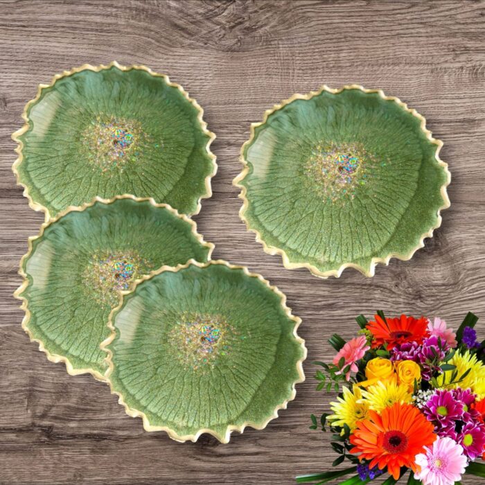 "Handcrafted green resin coasters with a sleek and vibrant design, offering durable surface protection for any table setting."