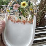 Handcrafted resin trinket tray with glossy finish, ideal for organizing jewelry, keys, and small accessories.
