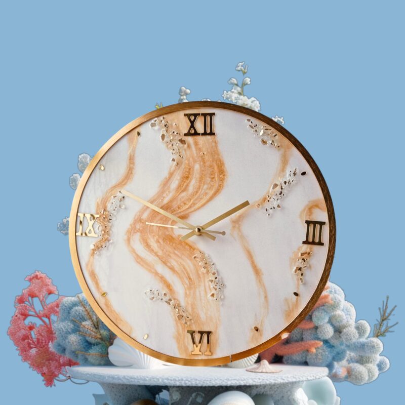 "Golden Sands resin wall clock with marble swirl design and gold Roman numerals"