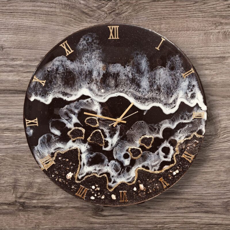 "Midnight Tide resin wall clock with ocean wave design and gold Roman numerals"