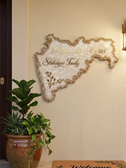 Handmade resin nameplate in Maharashtra map shape with golden border, customized family name and flat number, decorative welcome name board for home entrance.
